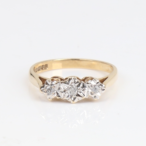 1431 - A late 20th century 9ct gold 3-stone diamond ring set with modern brown brilliant-cut diamonds in il... 