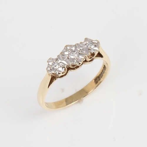 1431 - A late 20th century 9ct gold 3-stone diamond ring set with modern brown brilliant-cut diamonds in il... 