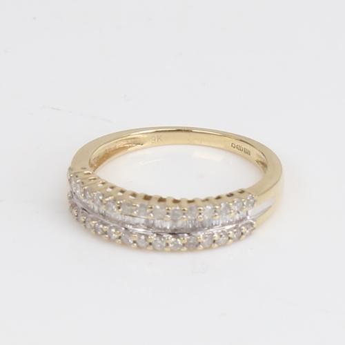 1432 - A modern 9ct gold diamond half hoop ring, set with modern round brilliant and baguette-cut diamonds,... 