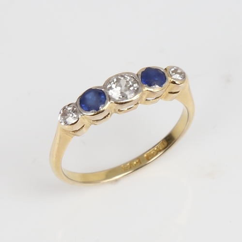 1446 - An early 20th century 18ct gold graduated 5-stone sapphire and diamond ring, platinum tops set with ... 