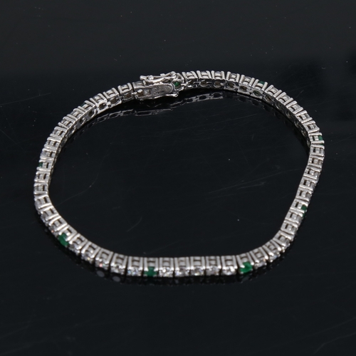 1452 - A modern silver emerald and CZ tennis line bracelet, bracelet length 18cm, 10.5g