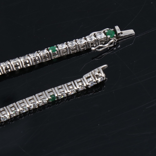 1452 - A modern silver emerald and CZ tennis line bracelet, bracelet length 18cm, 10.5g