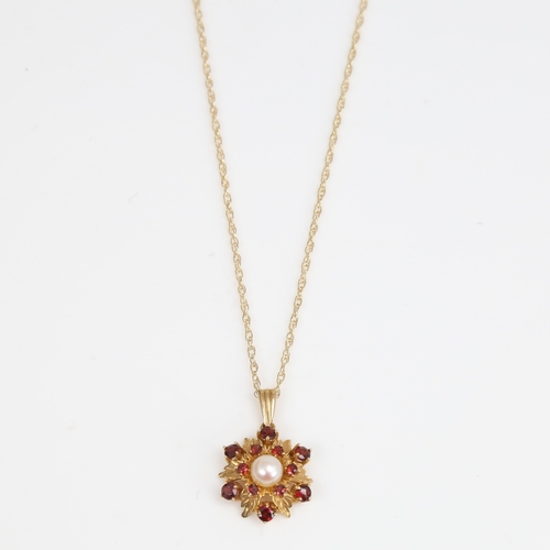 1453 - A late 20th century 9ct gold garnet and pearl floral pendant necklace, pendant height excluding bale... 