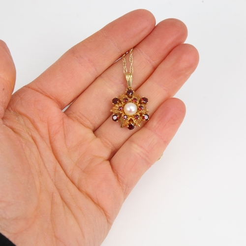 1453 - A late 20th century 9ct gold garnet and pearl floral pendant necklace, pendant height excluding bale... 