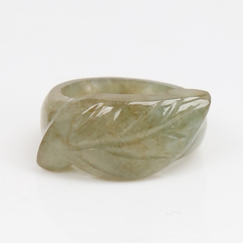 1454 - A carved and polished jade leaf ring, setting height 11.6mm, size N, 6.3g