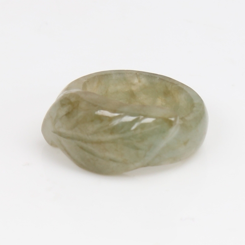 1454 - A carved and polished jade leaf ring, setting height 11.6mm, size N, 6.3g