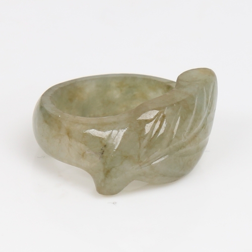 1454 - A carved and polished jade leaf ring, setting height 11.6mm, size N, 6.3g