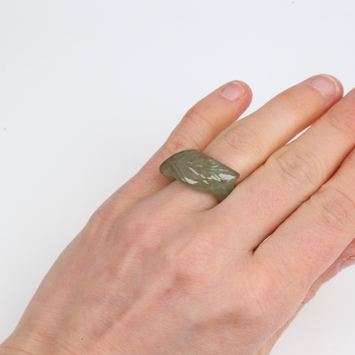 1454 - A carved and polished jade leaf ring, setting height 11.6mm, size N, 6.3g