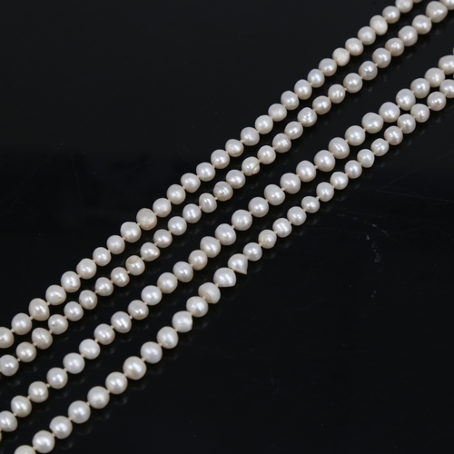 1457 - A long single-strand cultured pearl sautoir necklace, necklace length 128cm, 53.8g