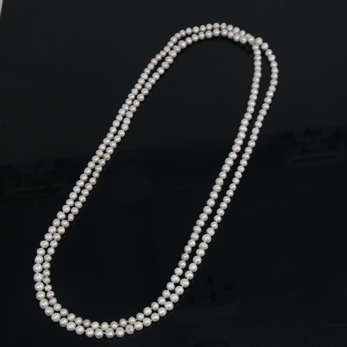 1457 - A long single-strand cultured pearl sautoir necklace, necklace length 128cm, 53.8g