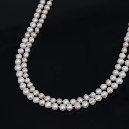 1457 - A long single-strand cultured pearl sautoir necklace, necklace length 128cm, 53.8g