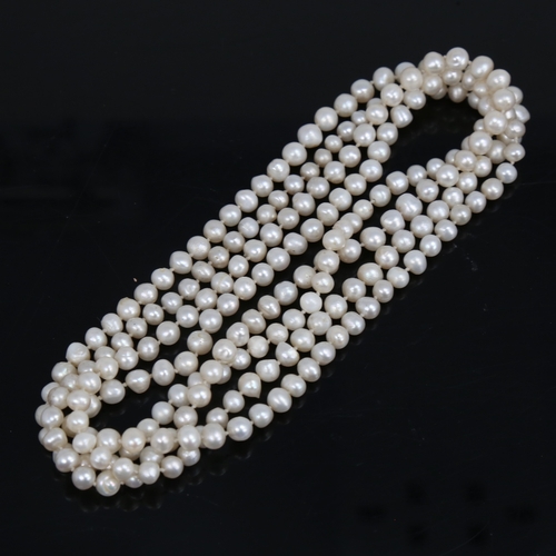 1457 - A long single-strand cultured pearl sautoir necklace, necklace length 128cm, 53.8g