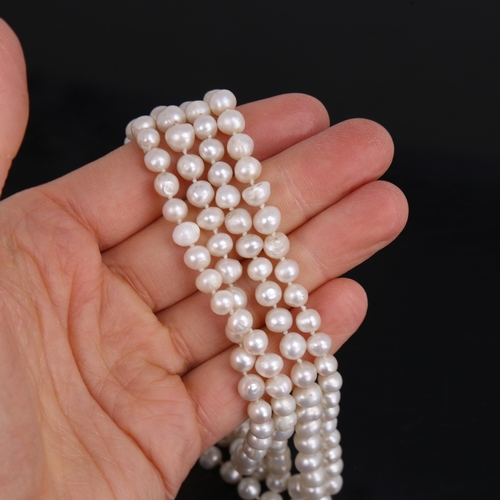 1457 - A long single-strand cultured pearl sautoir necklace, necklace length 128cm, 53.8g