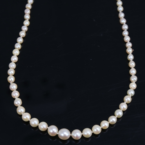 1460 - A single-strand graduated pearl necklace, with unmarked white metal rose-cut diamond set clasp, pear... 