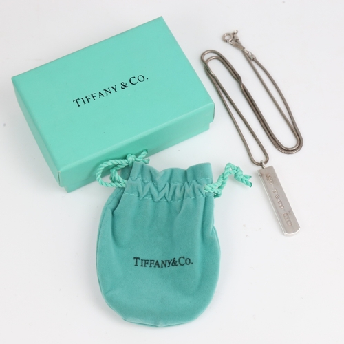 1474 - ELSA PERETTI for TIFFANY & CO - a sterling silver ingot pendant necklace, stamped 2001, with origina... 