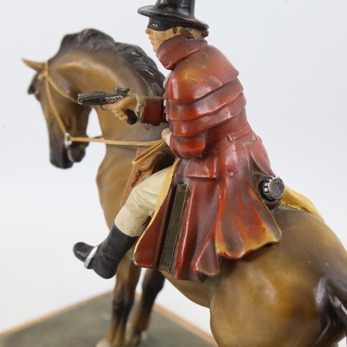 436 - A cold painted table lighter / striker in the form of Dick Turpin on horseback