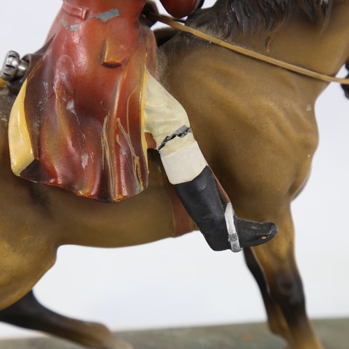 436 - A cold painted table lighter / striker in the form of Dick Turpin on horseback