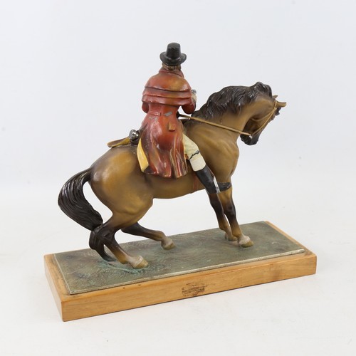 436 - A cold painted table lighter / striker in the form of Dick Turpin on horseback