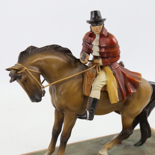 436 - A cold painted table lighter / striker in the form of Dick Turpin on horseback