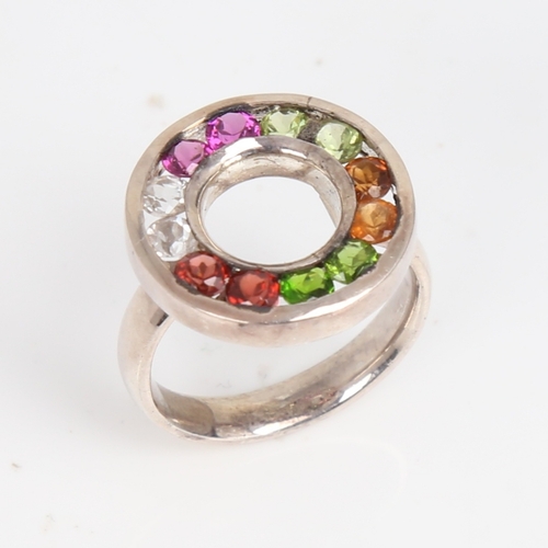 1479 - A modern handmade unmarked silver gem set halo ring, setting height 19.2mm, size P, 6.7g