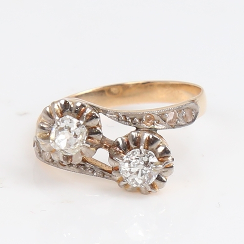 1480 - An Antique unmarked gold diamond crossover ring, set with old and rose-cut diamonds, total diamond c... 