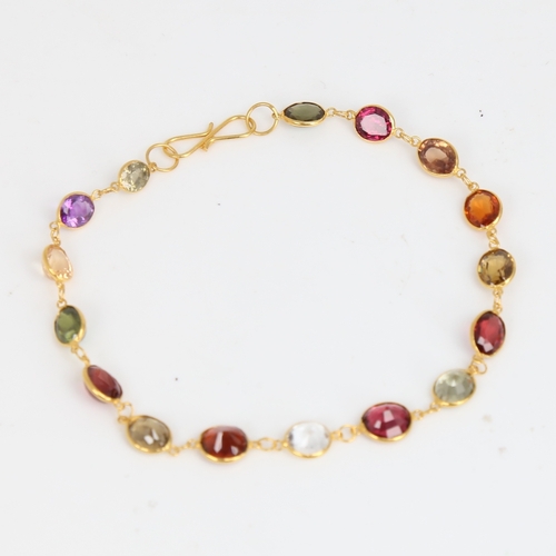 1481 - A modern handmade 14ct gold vari-hue sapphire bracelet, set with oval mixed-cut sapphires, bracelet ... 