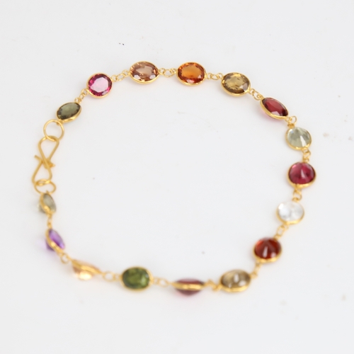 1481 - A modern handmade 14ct gold vari-hue sapphire bracelet, set with oval mixed-cut sapphires, bracelet ... 