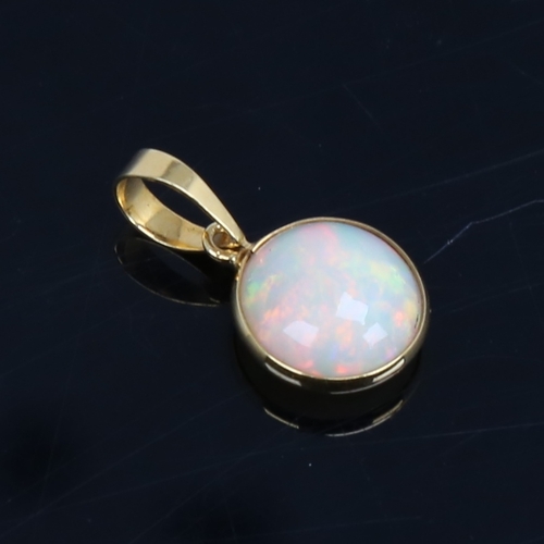 1484 - A modern handmade unmarked gold Ethiopian opal pendant, set with round cabochon opal, settings test ... 