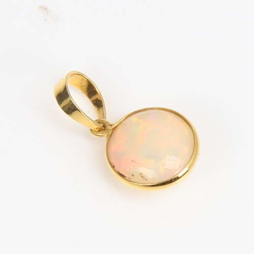 1484 - A modern handmade unmarked gold Ethiopian opal pendant, set with round cabochon opal, settings test ... 