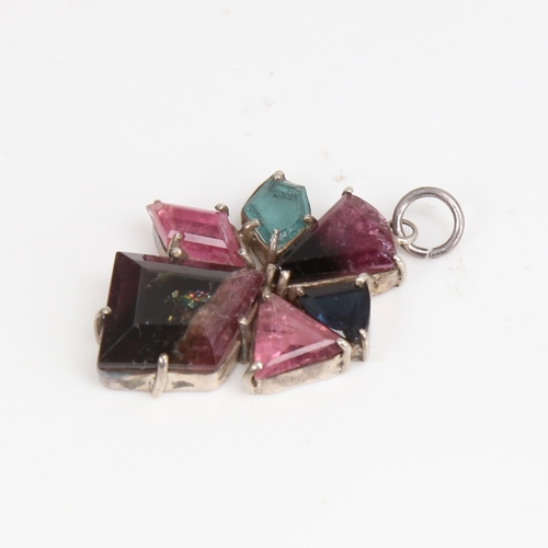 1485 - A modern handmade unmarked silver vari-hue tourmaline pendant, set with fantasy-cut tourmalines, pen... 