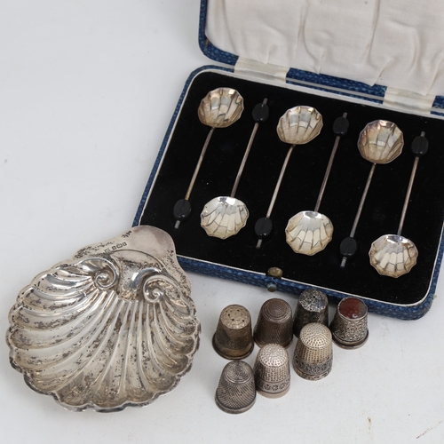 1508 - Various silver, including thimbles, shell butter dish and coffee bean spoons, 2.2oz weighable