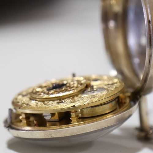 1025 - An 18th century silver pair-cased open-face keywind Verge pocket watch, white enamel dial with Arabi... 