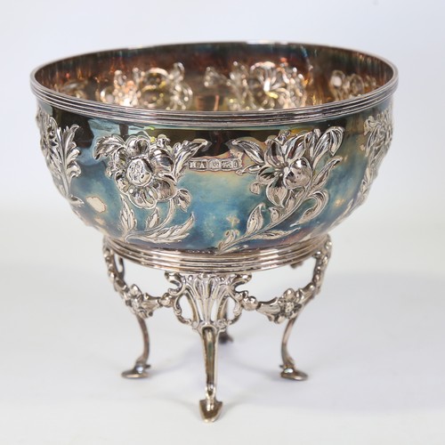 84 - A late Victorian Art Nouveau silver bowl on stand, relief embossed floral decoration with floral swa... 