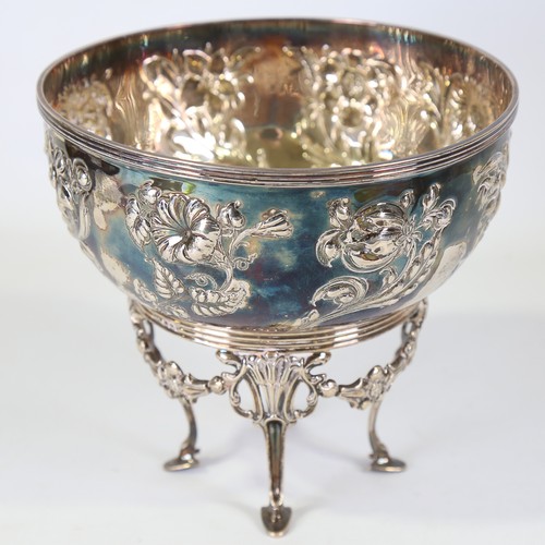 84 - A late Victorian Art Nouveau silver bowl on stand, relief embossed floral decoration with floral swa... 