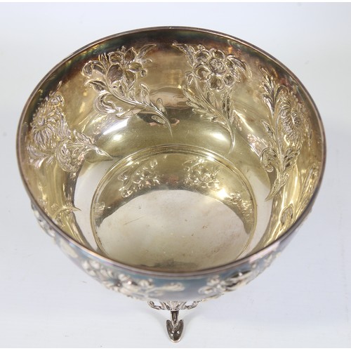 84 - A late Victorian Art Nouveau silver bowl on stand, relief embossed floral decoration with floral swa... 