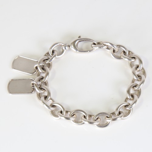 91 - GUCCI - a heavy Italian silver curb link bracelet, with 2 Dog Tag charms, bracelet length 20cm, 51.8... 