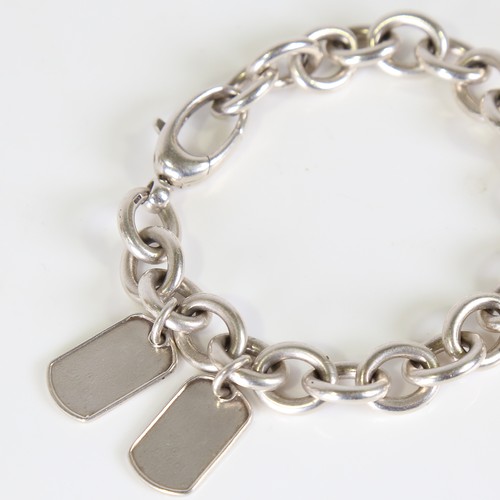 91 - GUCCI - a heavy Italian silver curb link bracelet, with 2 Dog Tag charms, bracelet length 20cm, 51.8... 