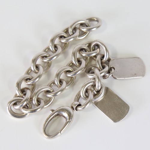 91 - GUCCI - a heavy Italian silver curb link bracelet, with 2 Dog Tag charms, bracelet length 20cm, 51.8... 