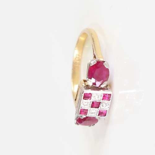 99 - An Art Deco style 18ct gold ruby and diamond panel ring, geometric chequerboard panel design set wit... 