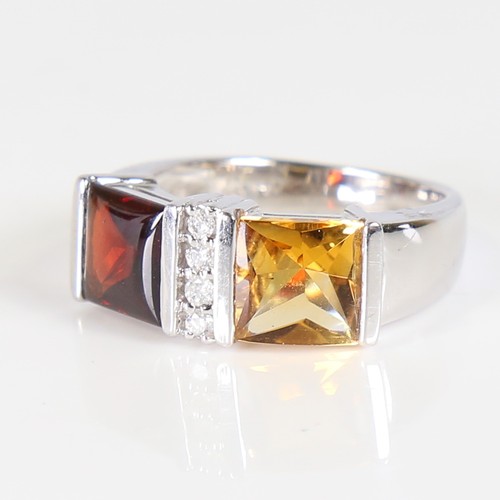 109 - A modern 18ct white gold citrine garnet and diamond dress ring, set with cabochon princess cut stone... 