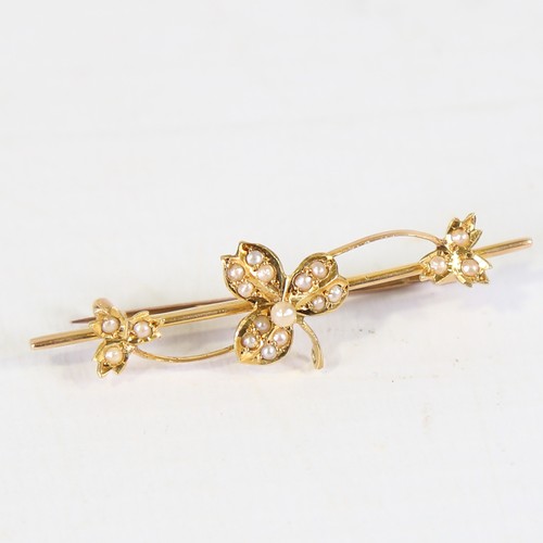 111 - An early 20th century 15ct gold split pearl leaf bar brooch, brooch length 45mm, 2.7g