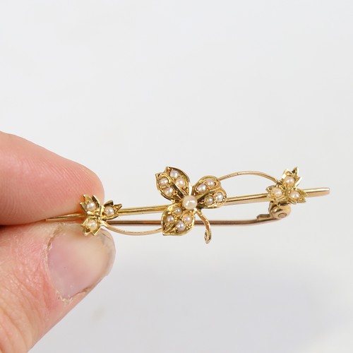 111 - An early 20th century 15ct gold split pearl leaf bar brooch, brooch length 45mm, 2.7g