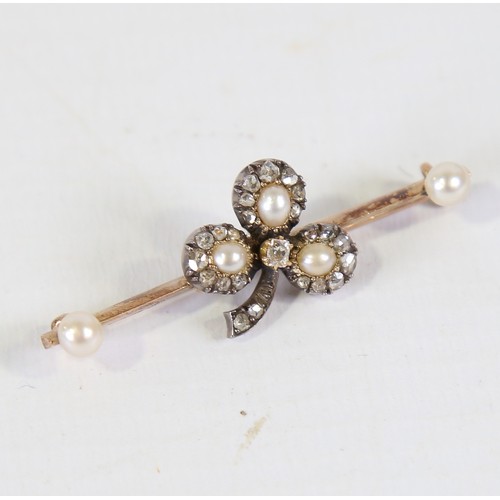 112 - An Antique pearl and diamond clover bar brooch, unmarked gold set with rose and old cut diamonds wit... 