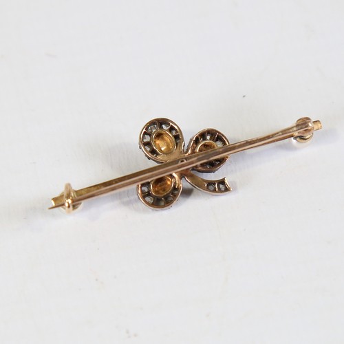 112 - An Antique pearl and diamond clover bar brooch, unmarked gold set with rose and old cut diamonds wit... 