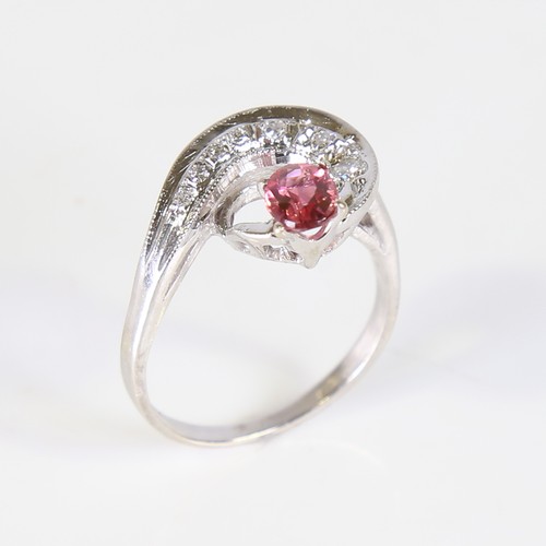 116 - A late 20th century 14ct white gold pink tourmaline and diamond cocktail ring, set with oval mixed c... 