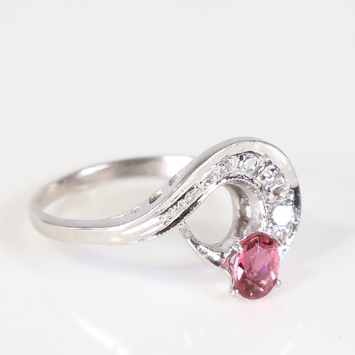 116 - A late 20th century 14ct white gold pink tourmaline and diamond cocktail ring, set with oval mixed c... 