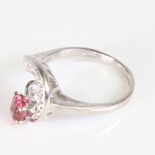 116 - A late 20th century 14ct white gold pink tourmaline and diamond cocktail ring, set with oval mixed c... 