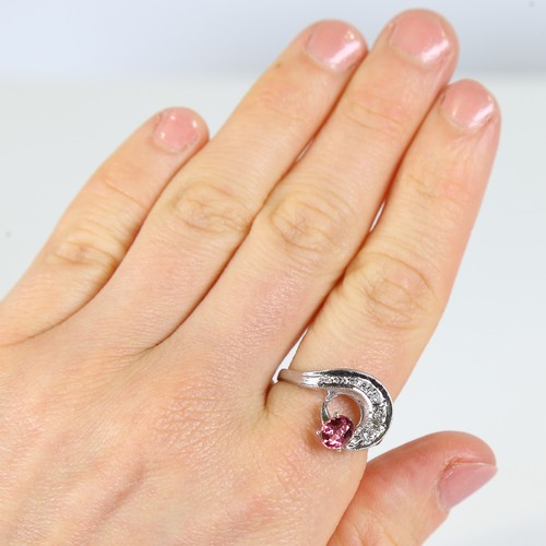 116 - A late 20th century 14ct white gold pink tourmaline and diamond cocktail ring, set with oval mixed c... 