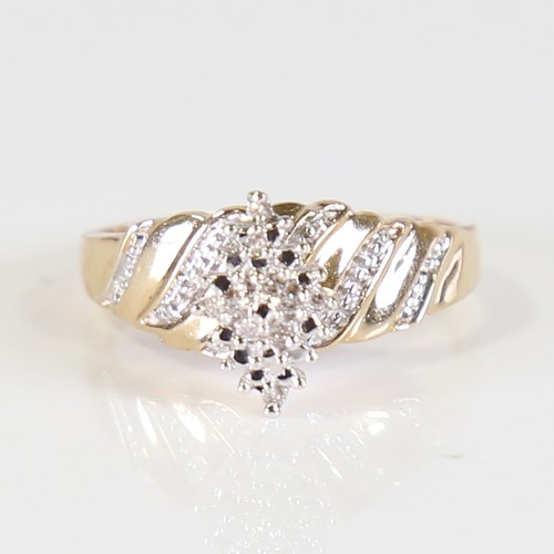 117 - A modern 9ct gold diamond marquise cluster ring, set with eight cut diamonds and illusion style shou... 