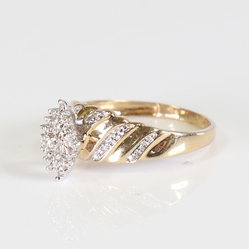 117 - A modern 9ct gold diamond marquise cluster ring, set with eight cut diamonds and illusion style shou... 